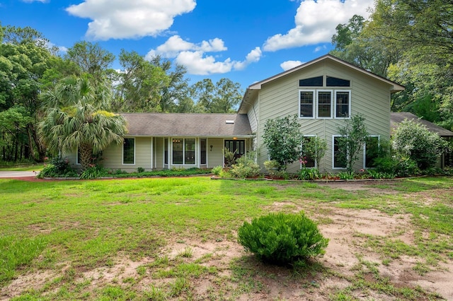 7201 SW 97th Ln, Gainesville, FL 32608 - view of front of home with a front lawn