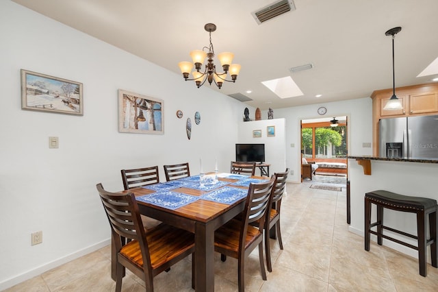 7201 SW 97th Ln, Gainesville, FL 32608 - dining room with a skylight, a chandelier, light tile patterned flooring, and recessed lighting
