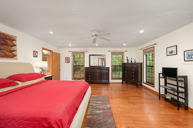 7201 SW 97th Ln, Gainesville, FL 32608 - bedroom with wood finished floors and recessed lighting