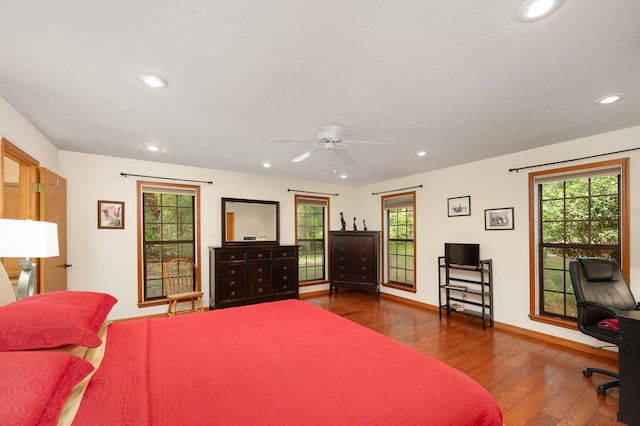 7201 SW 97th Ln, Gainesville, FL 32608 - bedroom with wood finished floors and recessed lighting