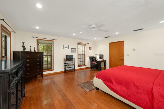 7201 SW 97th Ln, Gainesville, FL 32608 - bedroom featuring recessed lighting, wood finished floors, and an office area