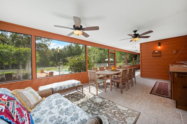 7201 SW 97th Ln, Gainesville, FL 32608 - sunroom / solarium with a ceiling fan, outdoor dining area, and healthy amount of natural light
