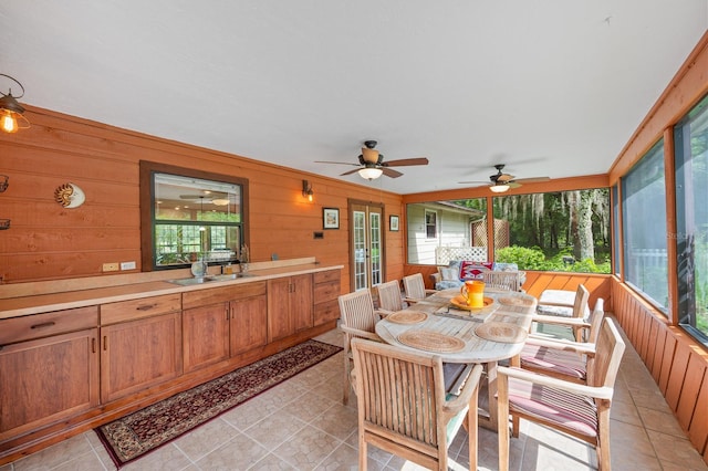 7201 SW 97th Ln, Gainesville, FL 32608 - sunroom / solarium featuring ceiling fan, outdoor dining space, and exterior kitchen