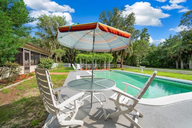 7201 SW 97th Ln, Gainesville, FL 32608 - view of pool featuring a sunroom and a patio area