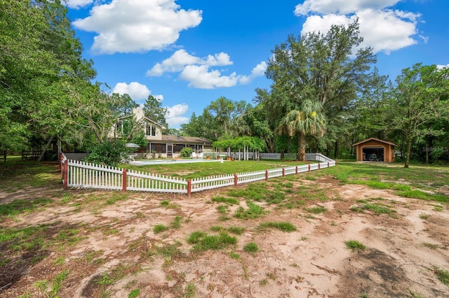 7201 SW 97th Ln, Gainesville, FL 32608 - fenced yard featuring an outdoor structure