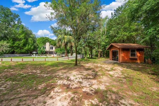 7201 SW 97th Ln, Gainesville, FL 32608 - view of yard with an outdoor structure