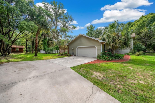 7201 SW 97th Ln, Gainesville, FL 32608 - view of front of home with driveway and a garage