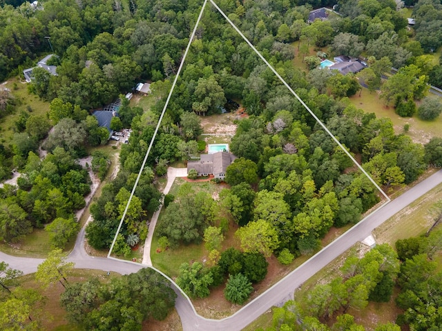 7201 SW 97th Ln, Gainesville, FL 32608 - aerial view of property's location with property boundaries highlighted and a forest