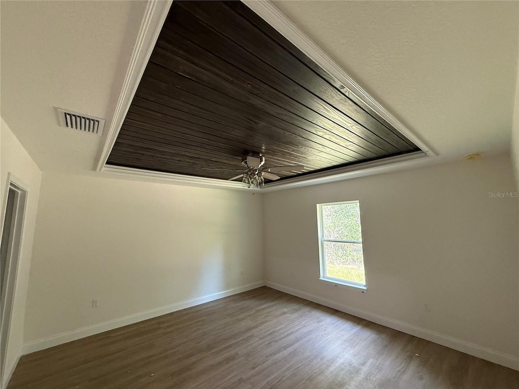 675 E Toledo Dr, Citrus Springs, FL 34434 - empty room with wood finished floors and ceiling fan