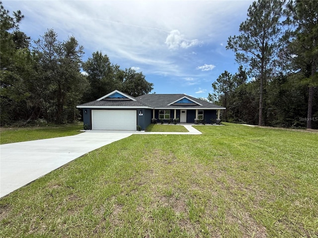 7946 N Manville Rd, Citrus Springs, FL 34434 - ranch-style home with a front yard, concrete driveway, and an attached garage