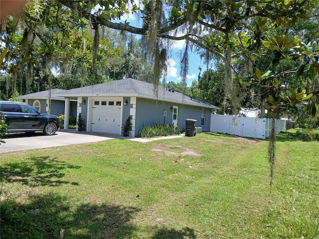 309 N Westwood St, Bushnell, FL 33513 - view of home's exterior with an attached garage, stucco siding, and concrete driveway