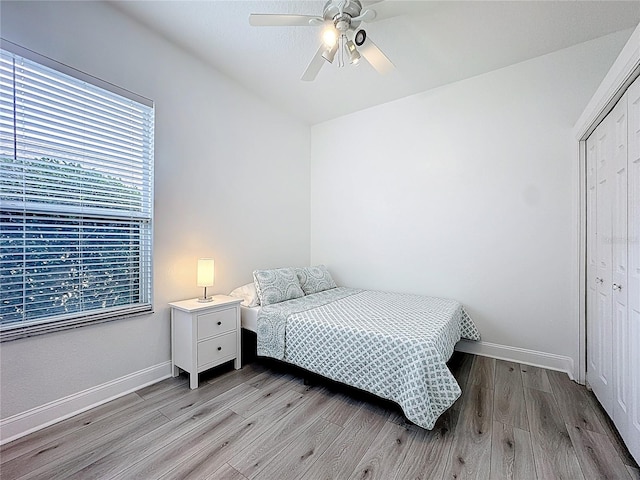 2421 Cimmaron Ash Way, Apopka, FL 32703 - bedroom featuring light wood finished floors, a closet, and a ceiling fan