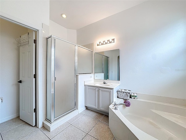 2421 Cimmaron Ash Way, Apopka, FL 32703 - full bath with a stall shower, vanity, a garden tub, and tile patterned floors