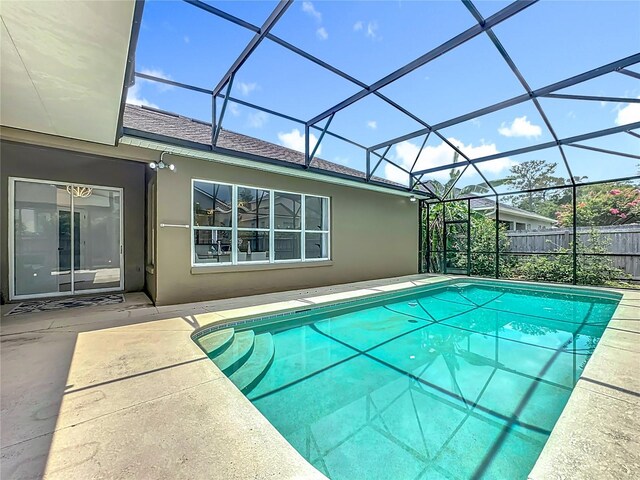 2421 Cimmaron Ash Way, Apopka, FL 32703 - view of swimming pool featuring a patio and a lanai