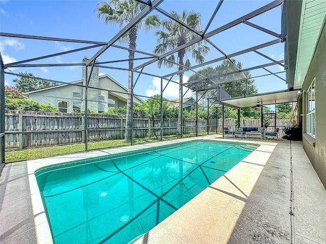 2421 Cimmaron Ash Way, Apopka, FL 32703 - view of swimming pool featuring a patio area, a fenced backyard, outdoor lounge area, and a lanai