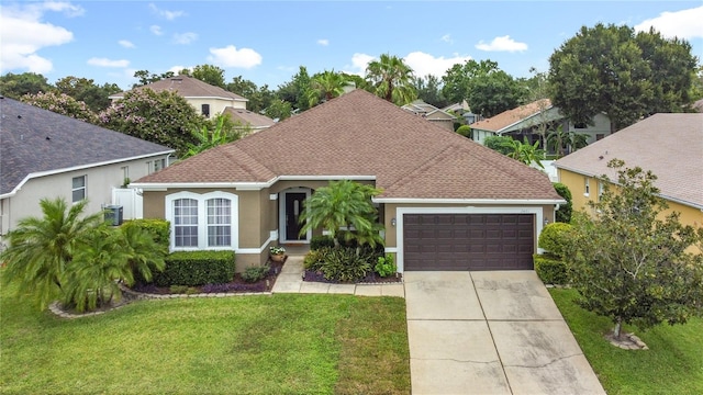 2421 Cimmaron Ash Way, Apopka, FL 32703 - view of front facade with a garage, driveway, a front lawn, and a shingled roof