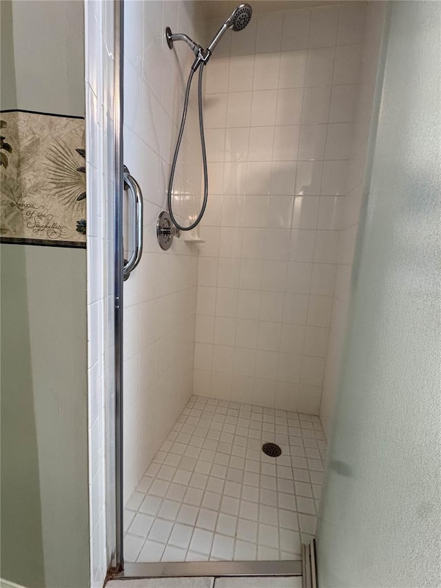 14933 Thoroughbred Ln, Montverde, FL 34756 - full bath featuring a shower stall and a textured wall
