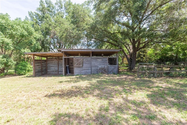 14933 Thoroughbred Ln, Montverde, FL 34756 - view of yard featuring an outdoor structure and an exterior structure