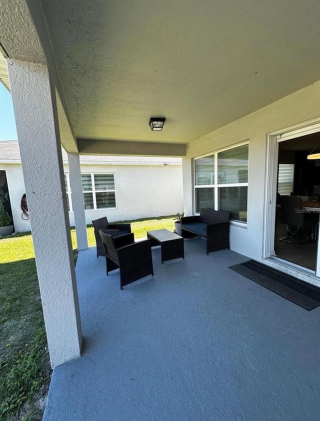 594 Preserve Pt, Davenport, FL 33837 - view of patio / terrace with an outdoor hangout area