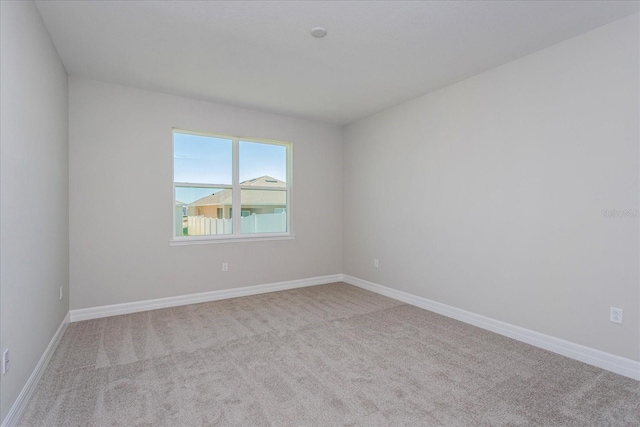 111 Bottle Brush Dr, Haines City, FL 33844 - spare room featuring carpet flooring