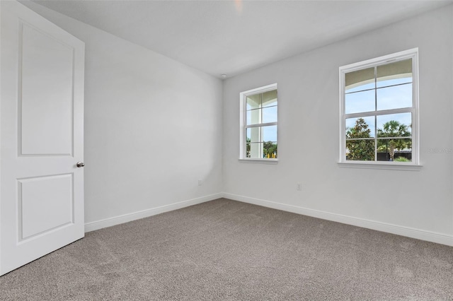 991 Fiesta Key Cir, Lady Lake, FL 32159 - carpeted spare room with baseboards