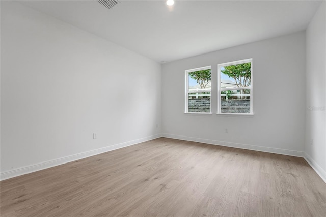 991 Fiesta Key Cir, Lady Lake, FL 32159 - empty room featuring light wood-style flooring and baseboards