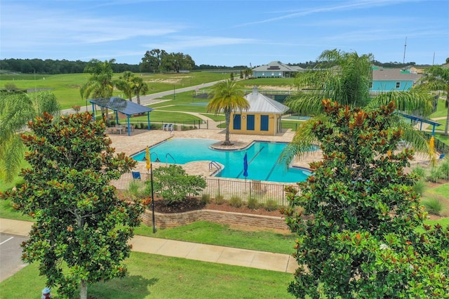 991 Fiesta Key Cir, Lady Lake, FL 32159 - community pool featuring a gazebo and a patio area