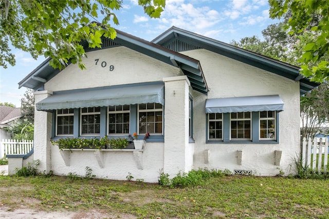 709 Daphne Ave, Umatilla, FL 32784 - view of front of home featuring stucco siding