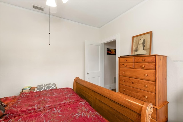 709 Daphne Ave, Umatilla, FL 32784 - bedroom with crown molding and ceiling fan
