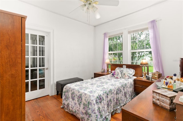 709 Daphne Ave, Umatilla, FL 32784 - bedroom featuring wood finished floors and a ceiling fan