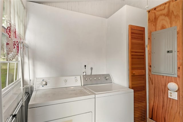 709 Daphne Ave, Umatilla, FL 32784 - laundry room with washing machine and clothes dryer and electric panel