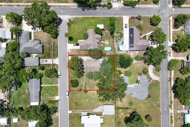 709 Daphne Ave, Umatilla, FL 32784 - aerial view of residential area with property parcel outlined