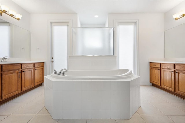 6109 Spinnaker Loop, Lady Lake, FL 32159 - bathroom featuring vanity, a bath, and tile patterned floors