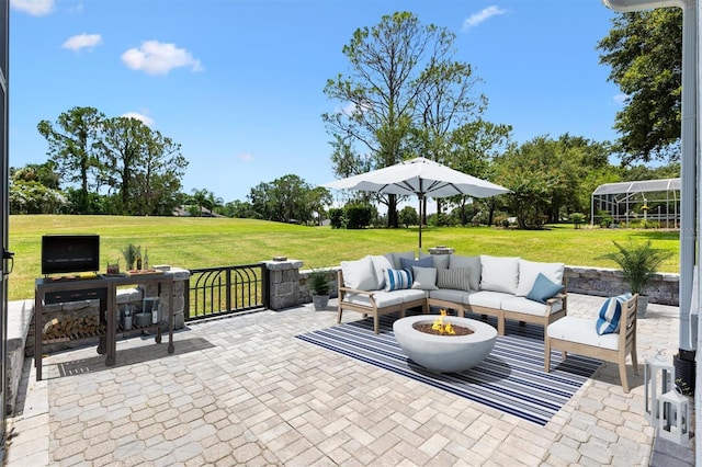 6109 Spinnaker Loop, Lady Lake, FL 32159 - view of patio / terrace with an outdoor living space with a fire pit