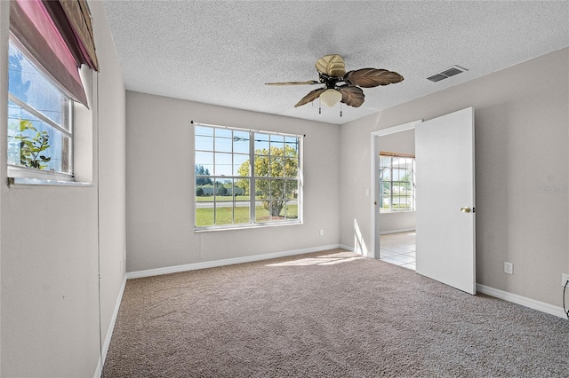 4751 Deer Run Rd, Saint Cloud, FL 34772 - carpeted empty room featuring a textured ceiling and ceiling fan