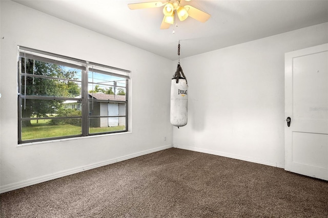 750 N Kentucky Ave, Umatilla, FL 32784 - carpeted empty room with ceiling fan and baseboards