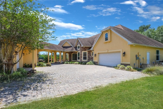 view of front of property with a garage