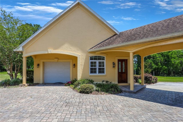 view of front of property with a garage