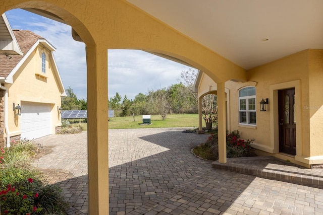 view of terrace featuring a garage