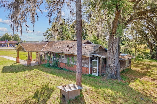 view of front of home with a front yard