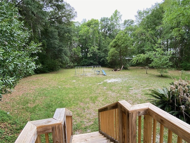 view of yard with a deck