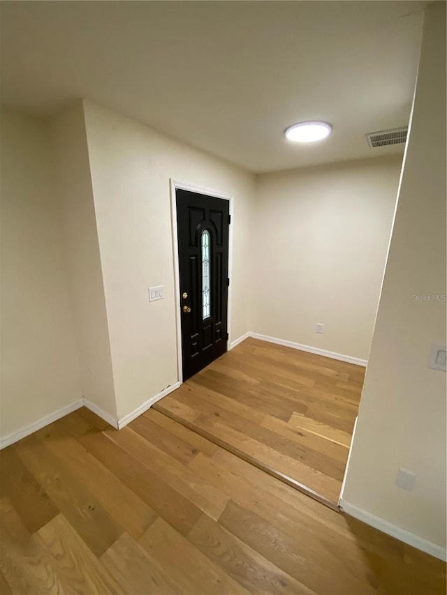 entrance foyer with hardwood / wood-style flooring