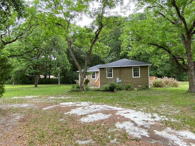 exterior space featuring a yard