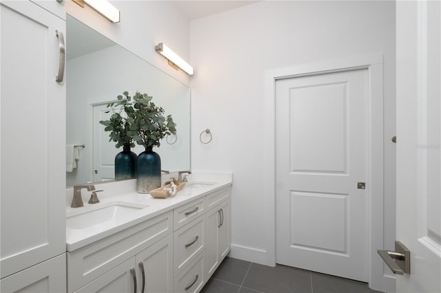 bathroom featuring tile patterned floors and vanity