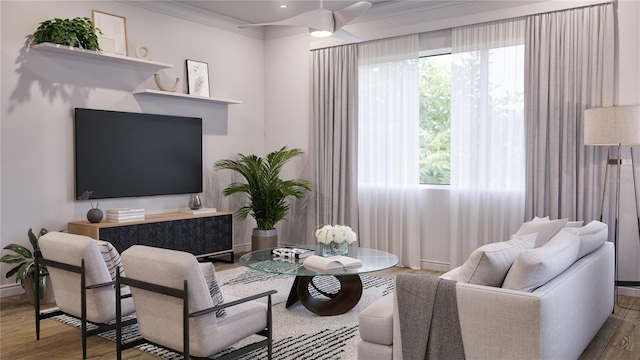 living room with wood-type flooring and crown molding