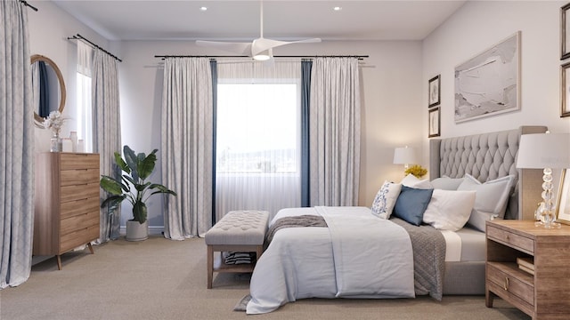 carpeted bedroom with ceiling fan