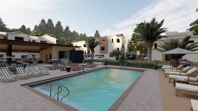 view of swimming pool with a patio area