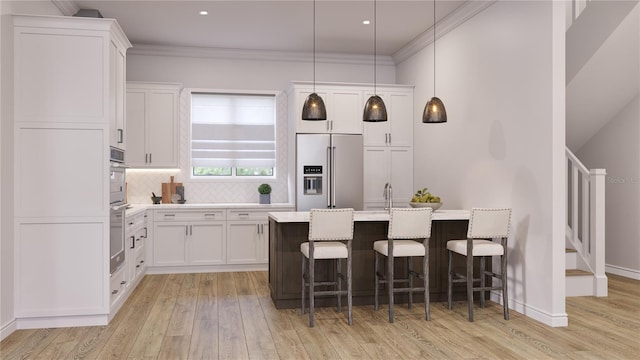 kitchen featuring light wood-type flooring, white cabinetry, hanging light fixtures, and high quality fridge