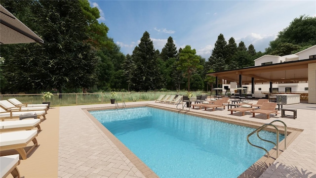 view of swimming pool featuring area for grilling and a patio