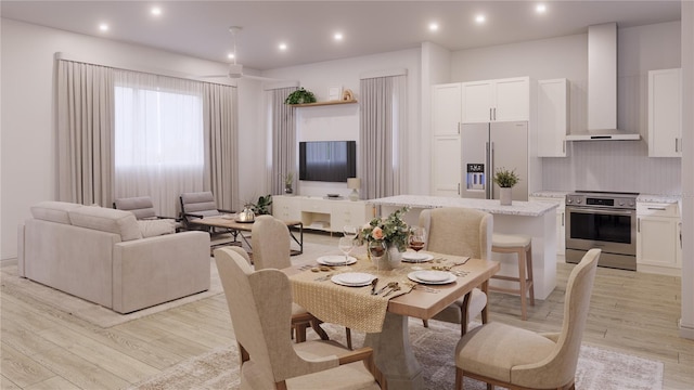 dining room featuring light hardwood / wood-style flooring